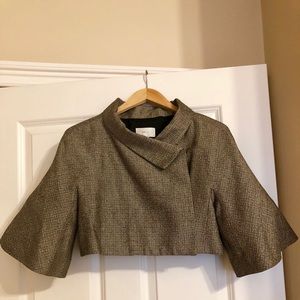 Cropped tweed jacket with bell sleeves.